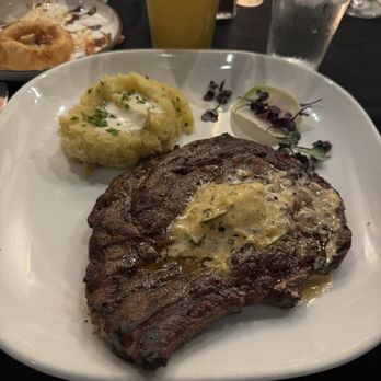 Gorat's Steak House signature dishes Whiskey Steak, Background Omaha Steaks, Atlantic Salmon, Billionaire Deviled Eggs